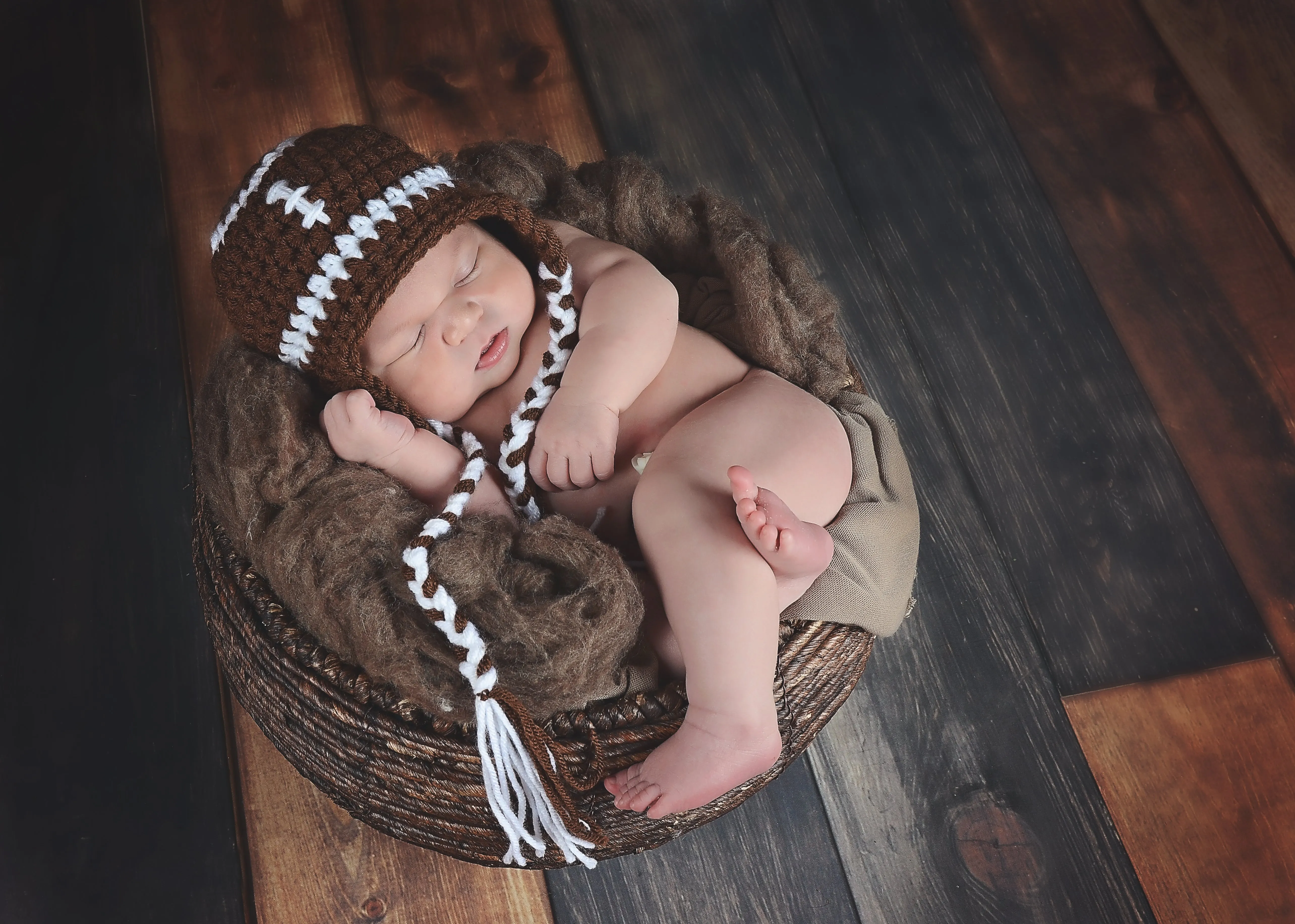Brown & white football earflap hat