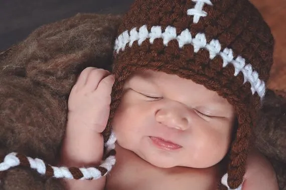 Brown & white football earflap hat