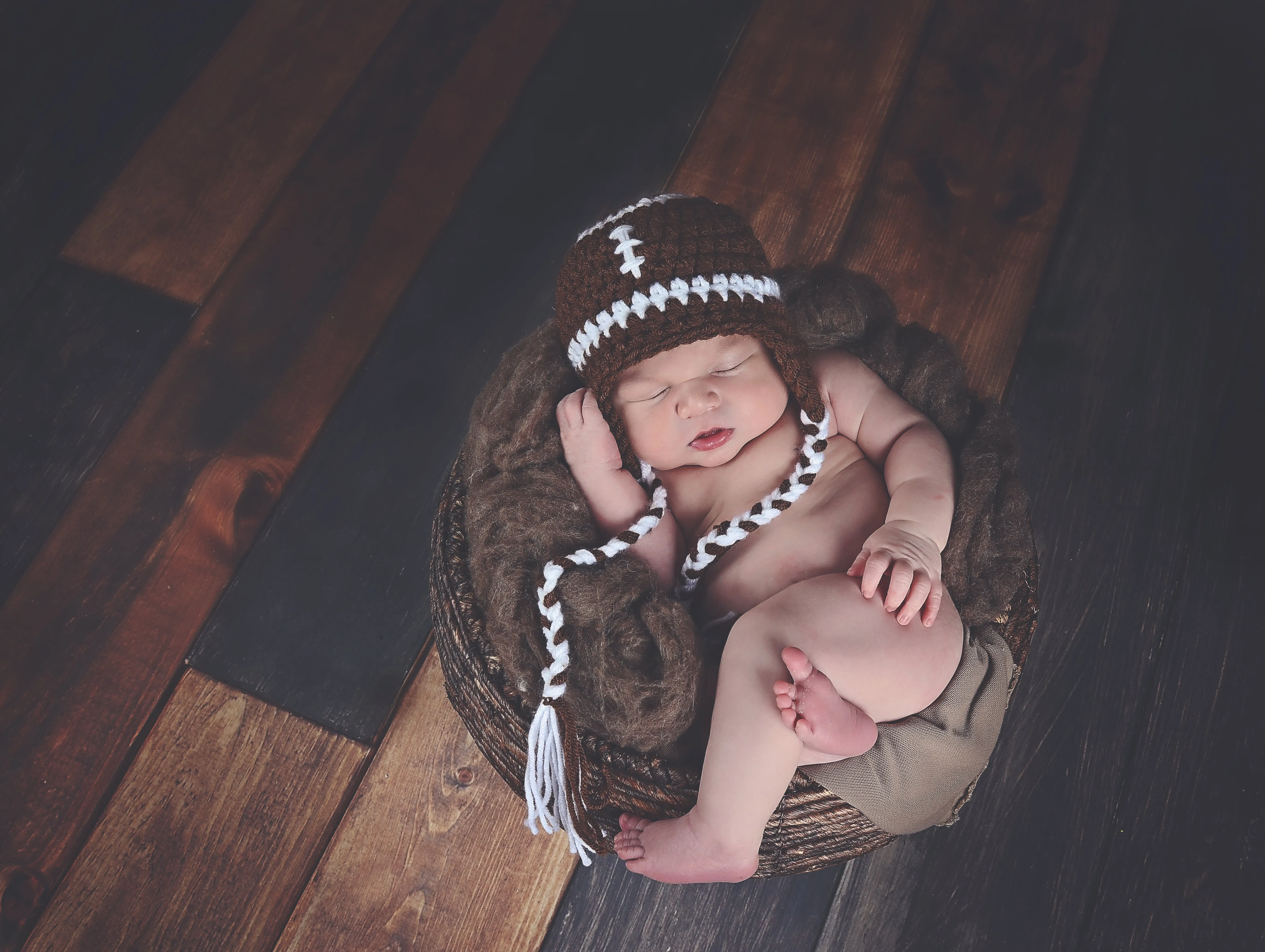 Brown & white football earflap hat